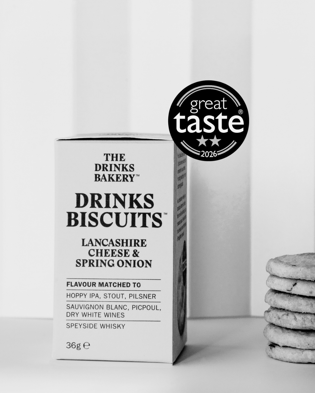 Winner of 2 Great Taste Stars 2026.

The Drinks Bakery Drinks Biscuits - Lancashire Cheese & Spring Onion are described as: 
