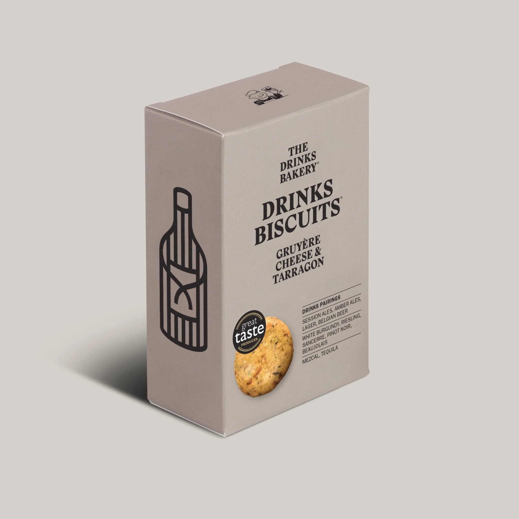 A rectangular product box for 'The Drinks Bakery Drinks Biscuits' on a solid light gray background. The box is a warm taupe-beige color with black text and a line-art illustration of a wine bottle.